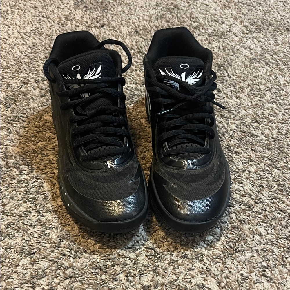 Black MELO by Puma